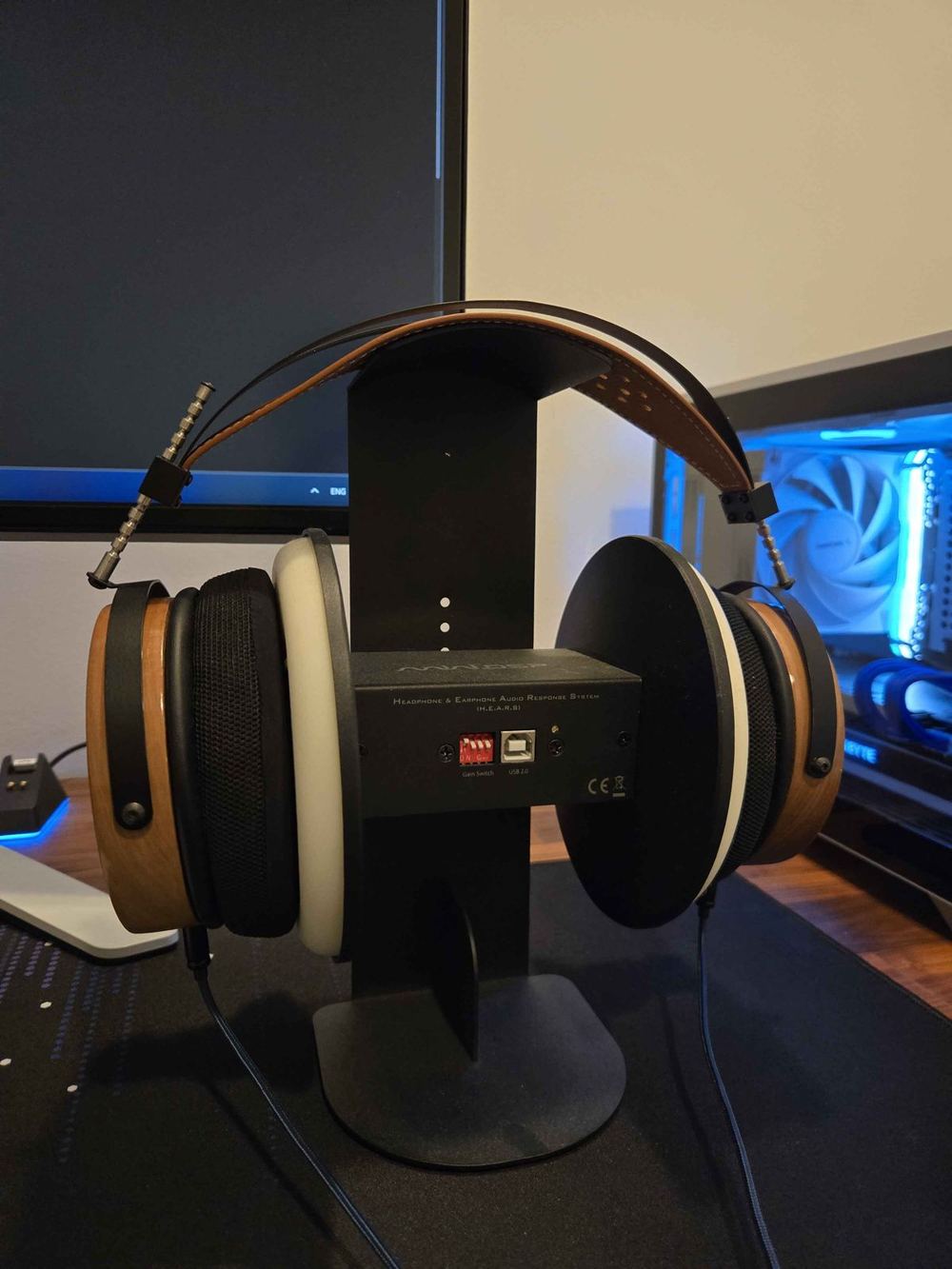 Headphones mounted on H.E.A.R.S measurement rig